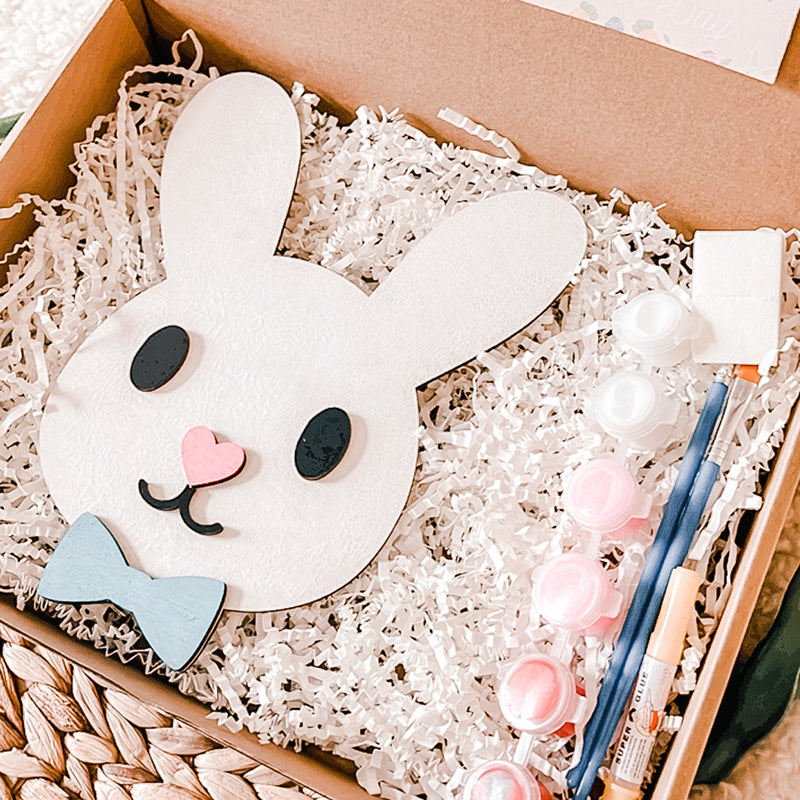 Easter Bunny boy with bow or girl bunny with flower painting Kit. kit includes everything you need to paint your very own boy or girl bunny face. Let your imagination run wild with 5 vibrant colors of paint, a paintbrush, cutouts, glue, and easy-to-follow instructions.