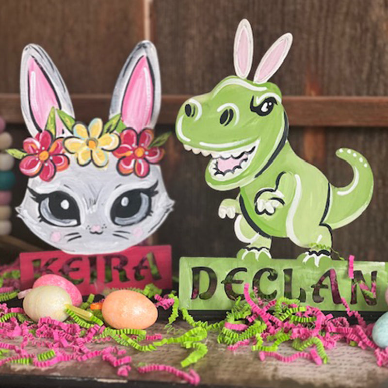 Personalize Easter Painting Kit with two choices. The bunny with flower crown or the t-rex with bunny ears. Comes with 2 coordinating eggs, paint, brushes to complete.
