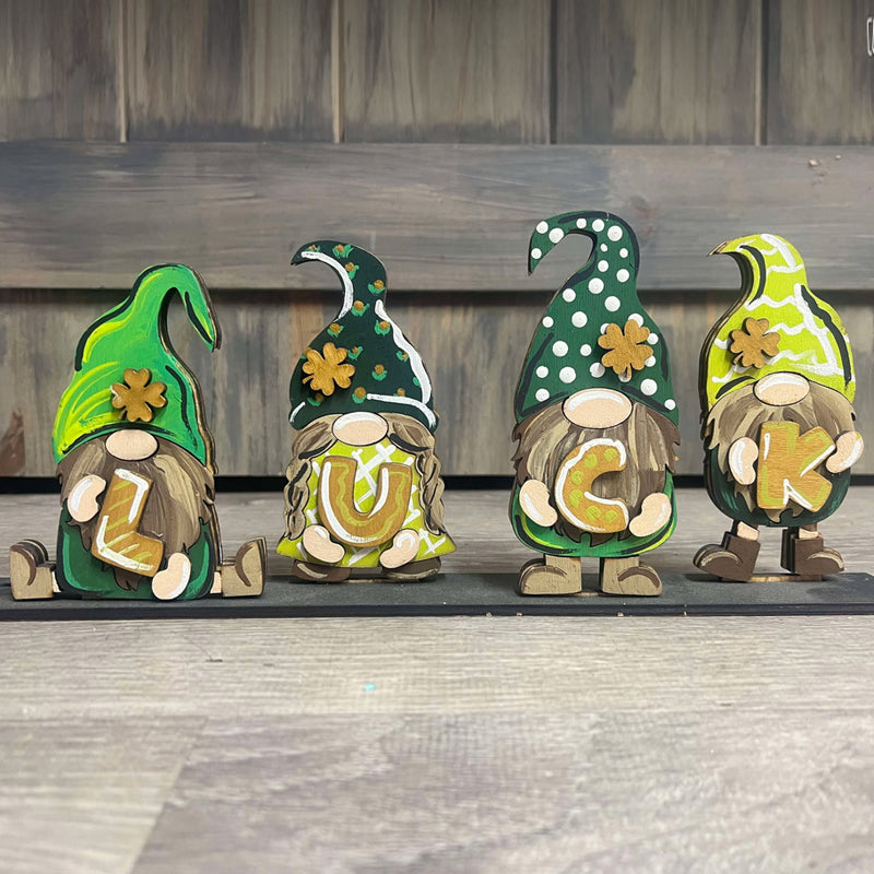 Reversible Holiday Gnomes Painting Kit. This fun gnome painting kit features Valentines Day and St Patrick's Day gnomes dresses in hats, hearts, clovers and have fun beards or braids. Once side reads LUCK for St Patrick's Day and the other side reads LOVE for Valentines Day